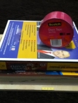 2 phone books between 2-3 inches thick, each